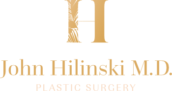 Gold letter "H" above text reading "John Hilinski M.D. Plastic Surgery" on a transparent background.